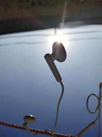 Low angle view of water drops on metal