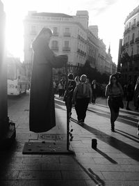 People walking on city street