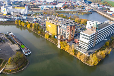 High angle view of river amidst buildings in city