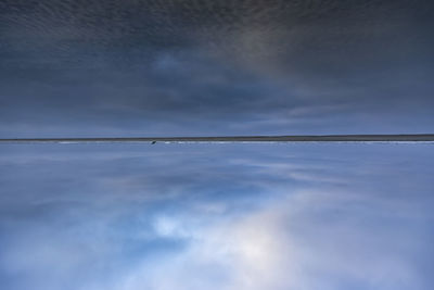 Low angle view of clouds over sea