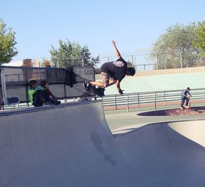 Full length of woman jumping in mid-air