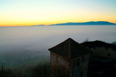 Scenic view of mountains at sunset