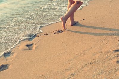 Low section of person on beach