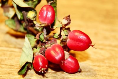 Close-up of cherries on table