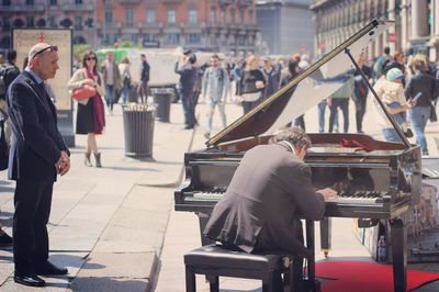 People sitting in town square