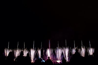 Firework display at night