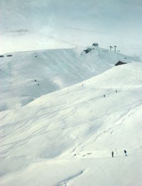 Scenic view of snow covered mountains