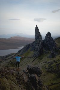 Scenic view of rocks on mountain against sky