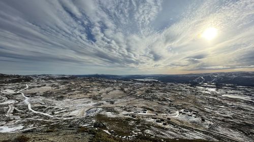 Sunny and scenic mountainview with magic clouds