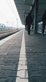 Man walking on road