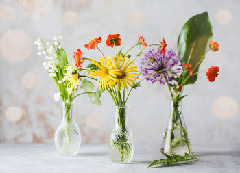 Close-up of flower vase on table