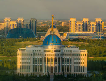 Buildings in city against sky