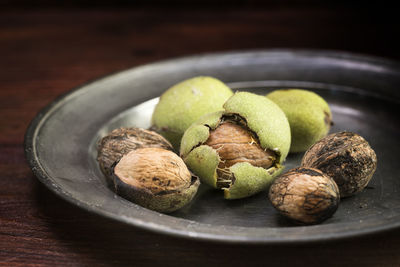 Close-up of fruits in plate on table