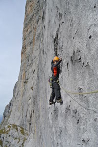 Full length of woman standing on rock
