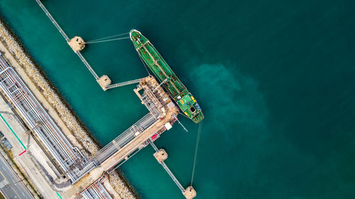 Aerial view of cargo container moored at dock