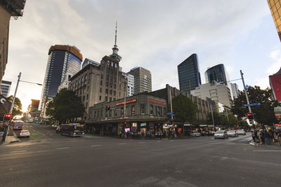 City street and modern buildings against sky