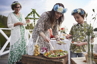 Family having midsummer dinner