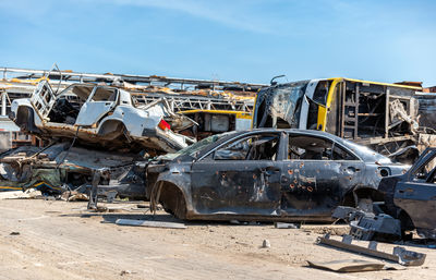 Cars on road against sky