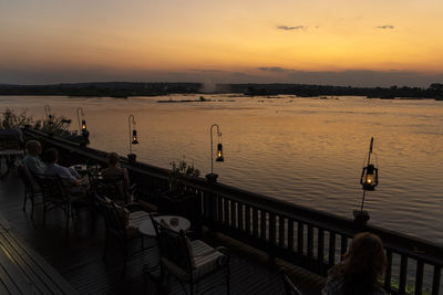 Scenic view of zambezi riveragainst sky during sunset