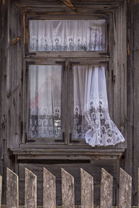 Low angle view of window of old building