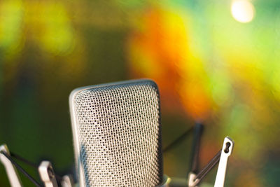 Close-up of mobile phone outdoors