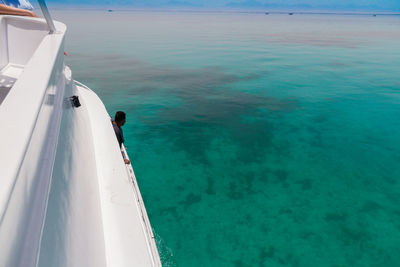 High angle view of sailboat sailing on sea against sky