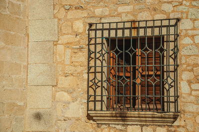 Low angle view of window on old building