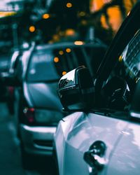 Close-up of side-view mirror of car