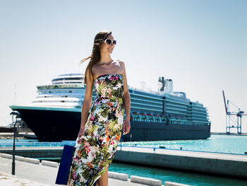 Woman in port of malaga, spain