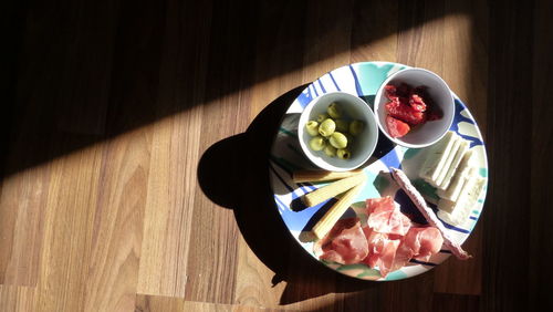 High angle view of fruits in bowl on table