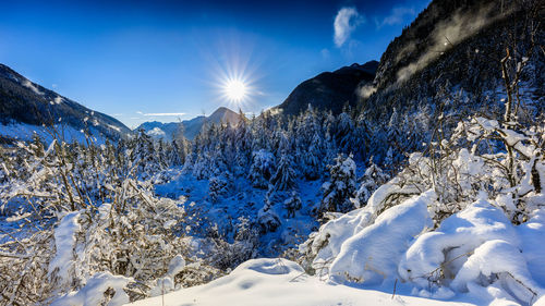Snow covered mountains against sky