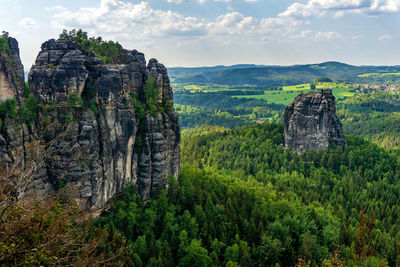 View of rock formation on landscape against sky