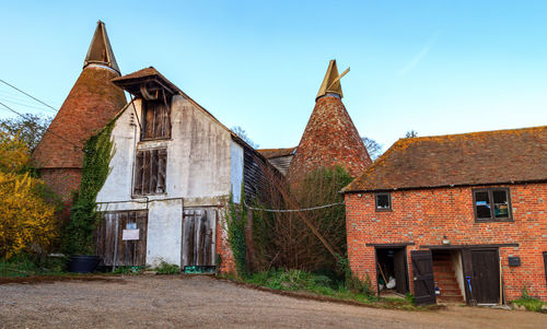 Old building against clear blue sky