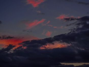 Low angle view of dramatic sky during sunset