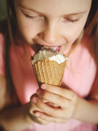 Close-up of girl holding ice cream