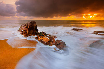 Scenic view of sea against sky during sunset