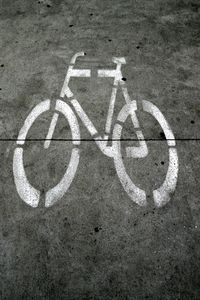 Close-up of white lines on road