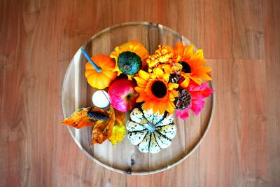 High angle view of various flowers in bowl on table