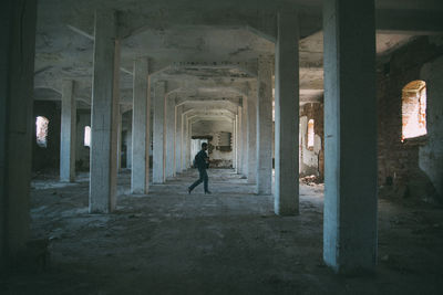 Man walking on corridor