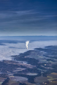 Scenic view of  power plant in clouds