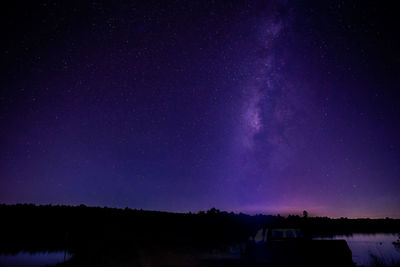 Scenic view of star field against sky at night