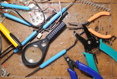 Various hand tools on table at workshop