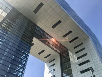 Low angle view of modern buildings against sky