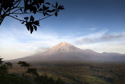 View of volcanic mountain against sky