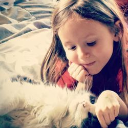 Close-up of cute girl with dog