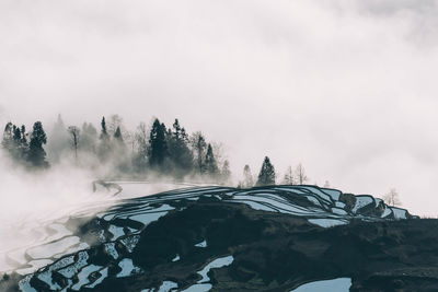 Scenic view of landscape and mountains against sky