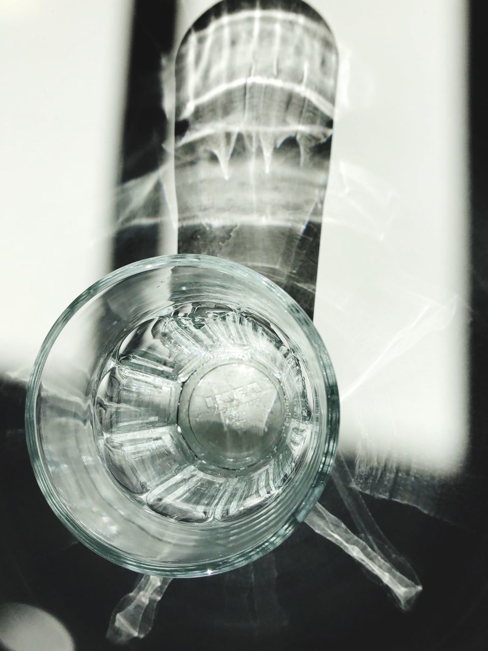 HIGH ANGLE VIEW OF GLASS OF WINE ON TABLE