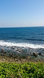 Scenic view of sea against clear sky