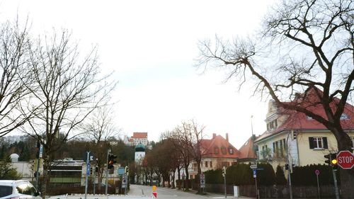 View of buildings in city against clear sky