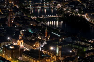 High angle view of illuminated buildings in city